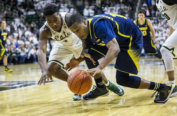 Muhammad-Ali Abdur-Rahkman (12) and Sean Lonergan (20)