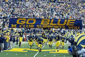 Tyrece Butler (9), Jeremy LeSueur (21), Chris Perry (23), John Navarre (16), David Underwood (5), Andy Mignery (14), and Mike Carl (26)