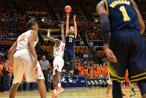 Nik Stauskas (11) and Glenn Robinson III (1)