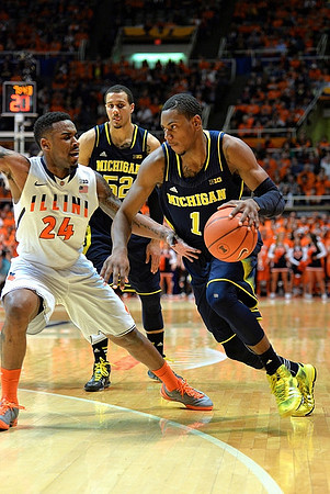 Jordan Morgan (52) and Glenn Robinson III (1)