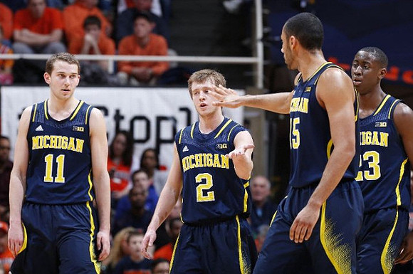 Nik Stauskas (11), Spike Albrecht (2), Jon Horford (15), and Caris LeVert (23)