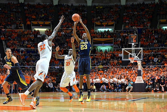 Jordan Morgan (52) and Caris LeVert (23)