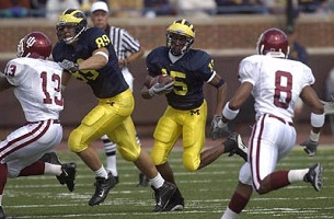 Steve Breaston (15) and Tyler Ecker (89)