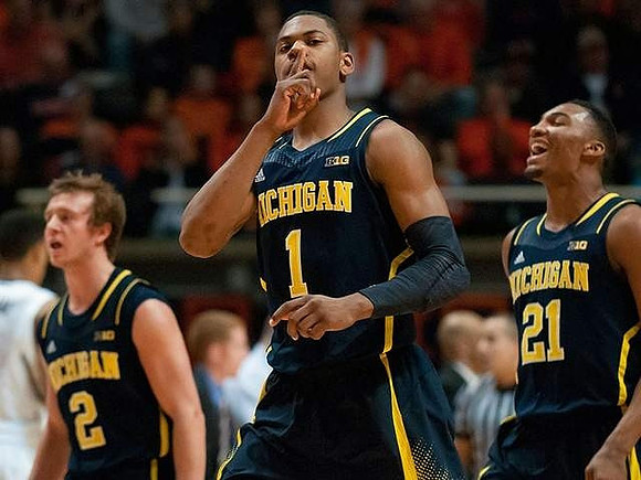 Spike Albrecht (2), Glenn Robinson III (1), and Zak Irvin (21)