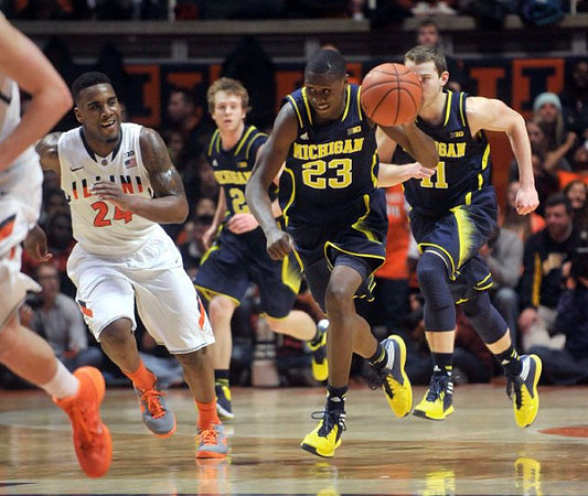 Spike Albrecht (2), Caris LeVert (23), and Nik Stauskas (11)