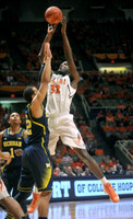 Glenn Robinson III (1) and Jordan Morgan (52)