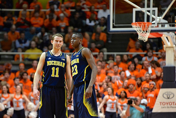 Nik Stauskas (11) and Caris LeVert (23)