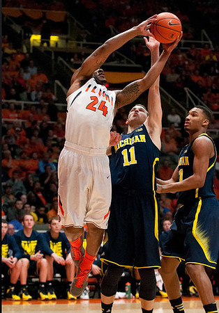 Nik Stauskas (11) and Zak Irvin (21)