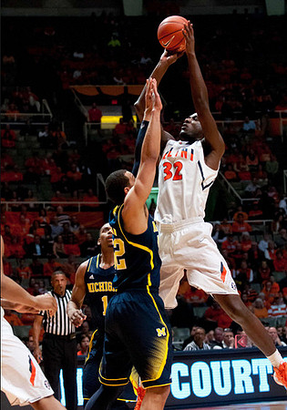 Glenn Robinson III (1) and Jordan Morgan (52)