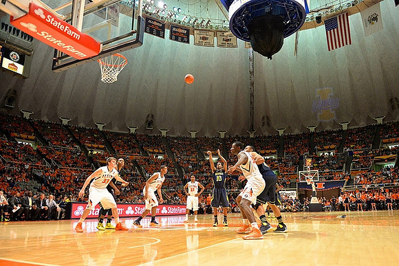 Glenn Robinson III (1), Derrick Walton Jr. (10), and Jon Horford (15)