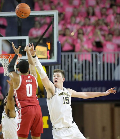David DeJulius (0) and Jon Teske (15)