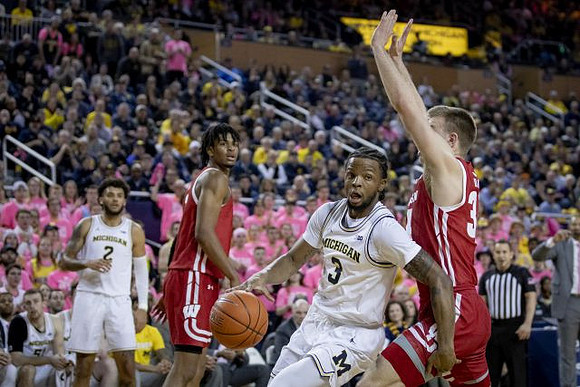 Isaiah Livers (2) and Zavier Simpson (3)