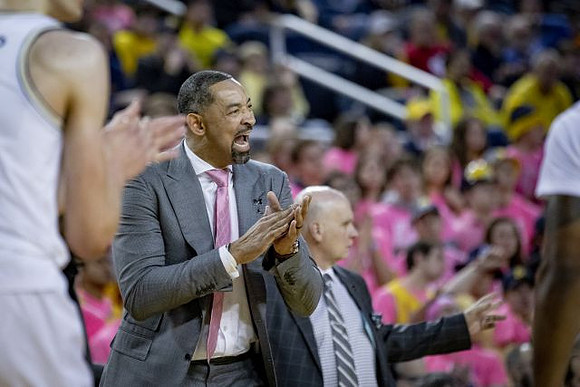Juwan Howard and Phil Martelli