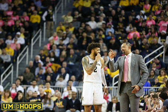 Isaiah Livers (2) and Juwan Howard