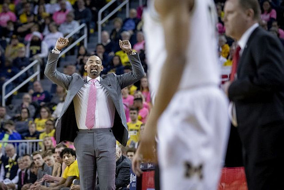 Juwan Howard and Wisconsin Head Coach Greg Gard