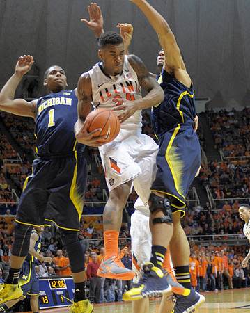 Glenn Robinson III (1) and Jon Horford (15)