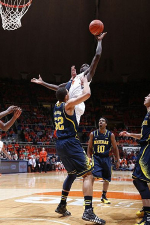 Jordan Morgan (52), Derrick Walton Jr. (10), and Nik Stauskas (11)