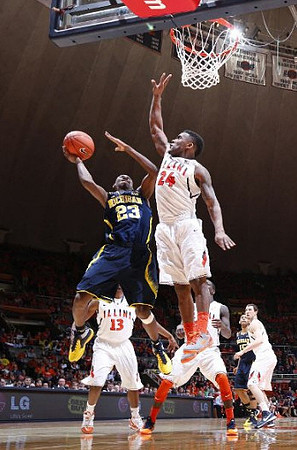 Caris LeVert (23) and Jon Horford (15)