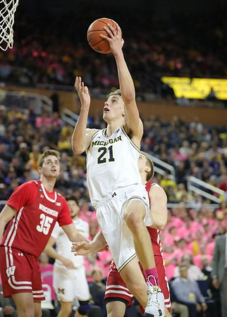 Franz Wagner (21) and Brandon Johns Jr. (23)