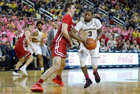 Zavier Simpson (3) and David DeJulius (0)