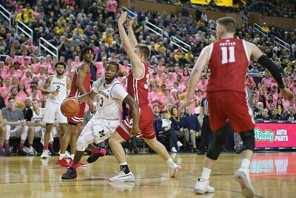 Isaiah Livers (2) and Zavier Simpson (3)