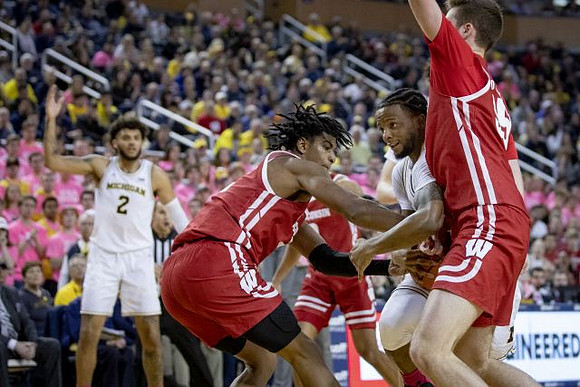 Isaiah Livers (2) and Zavier Simpson (3)
