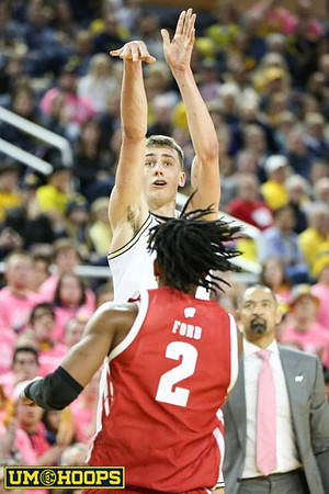 Franz Wagner (21) and Juwan Howard
