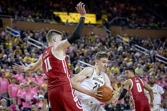 Franz Wagner (21) and Zavier Simpson (3)