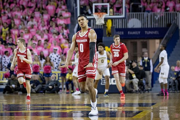 David DeJulius (0) and Zavier Simpson (3)