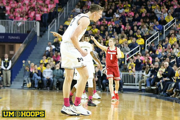 Franz Wagner (21) and Zavier Simpson (3)