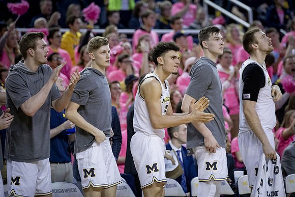 Jaron Faulds (44), Cole Bajema (22), Adrien Nunez (5), Colin Castleton (11), and Austin Davis (51)