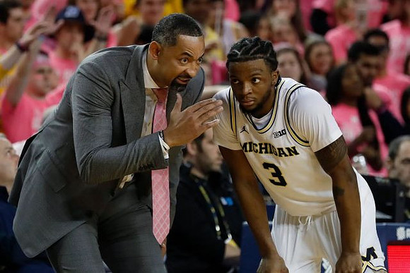 Juwan Howard and Zavier Simpson (3)