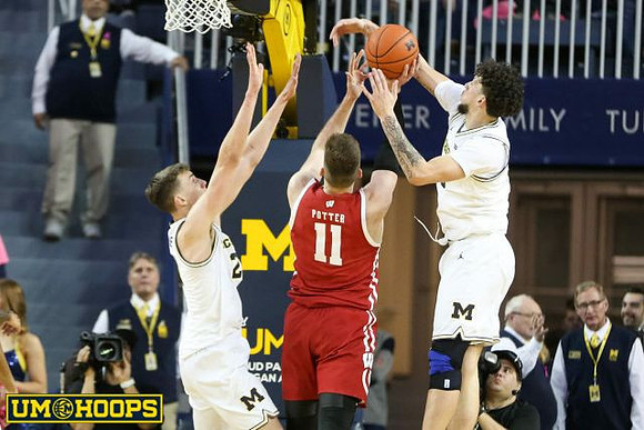 Franz Wagner (21) and Brandon Johns Jr. (23)
