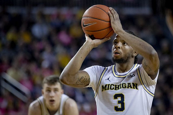 Zavier Simpson (3) and Franz Wagner (21)