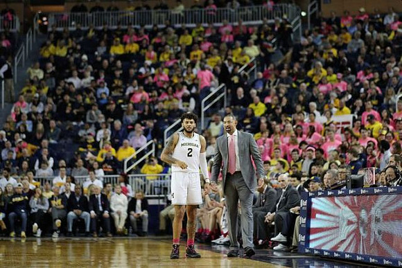 Isaiah Livers (2) and Juwan Howard