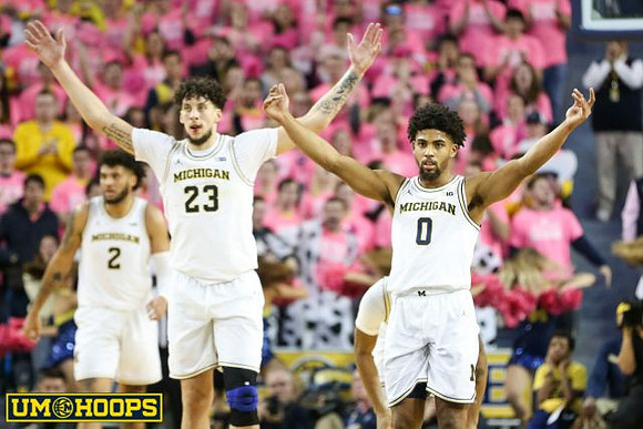 Isaiah Livers (2), Brandon Johns Jr. (23), and David DeJulius (0)