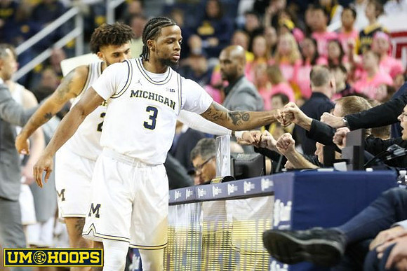 Isaiah Livers (2) and Zavier Simpson (3)
