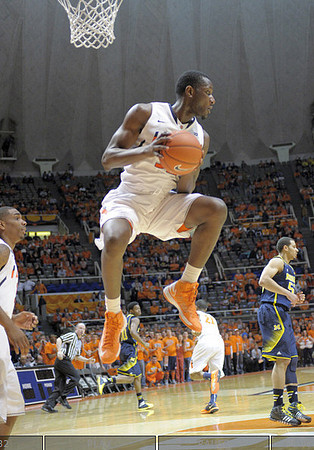Derrick Walton Jr. (10) and Jordan Morgan (52)