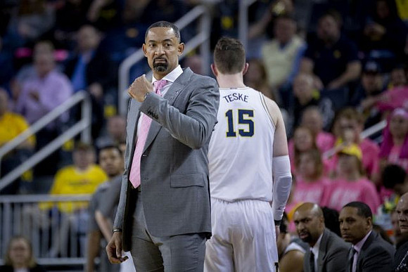 Juwan Howard, Jon Teske (15), Saddi Washington, Howard Eisley, and Phil Martelli