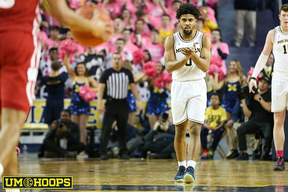 David DeJulius (0) and Jon Teske (15)