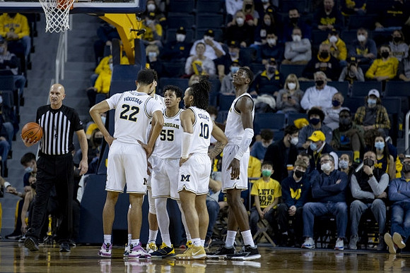 Caleb Houstan (22), Brandon Johns Jr. (23), Eli Brooks (55), Frankie Collins (10), and Moussa Diabate (14)