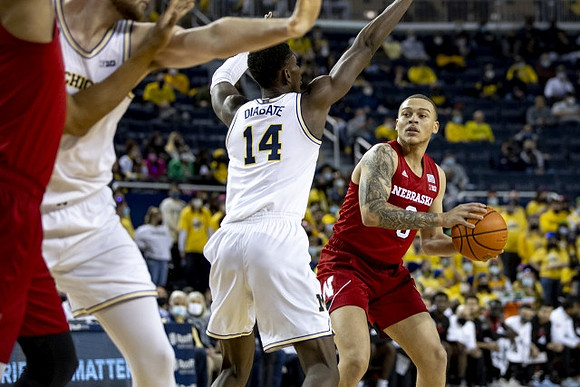 Hunter Dickinson (1) and Moussa Diabate (14)