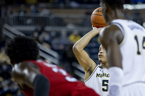 Terrance Williams II (5) and Moussa Diabate (14)