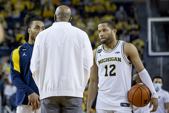 Frankie Collins (10), Saddi Washington, and DeVante' Jones (12)