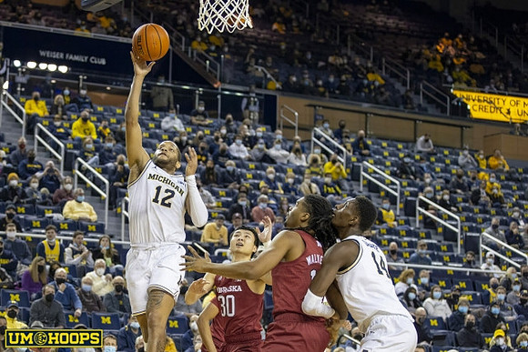 DeVante' Jones (12) and Moussa Diabate (14)