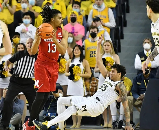 Eli Brooks (55) and Brandon Johns Jr. (23)