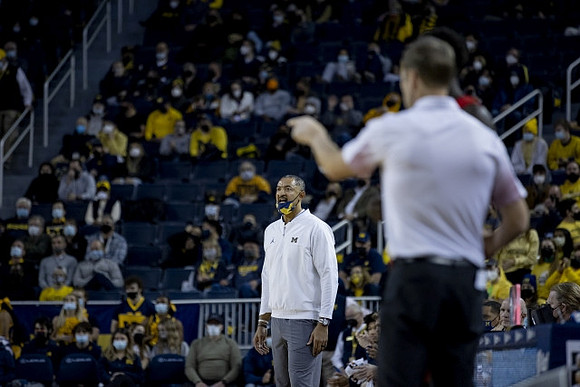 Juwan Howard and Nebraska Head Coach Fred Hoiberg