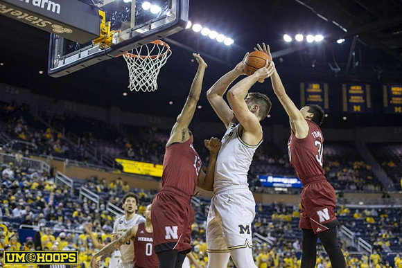Brandon Johns Jr. (23) and Hunter Dickinson (1)