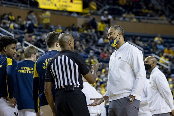 Juwan Howard, Saddi Washington, and Michigan Team