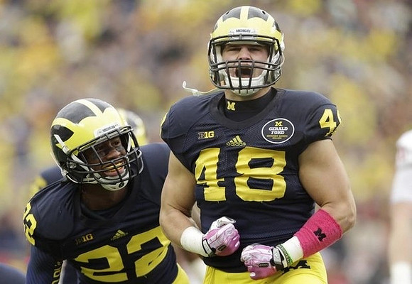 Jarrod Wilson (22) and Desmond Morgan (48)